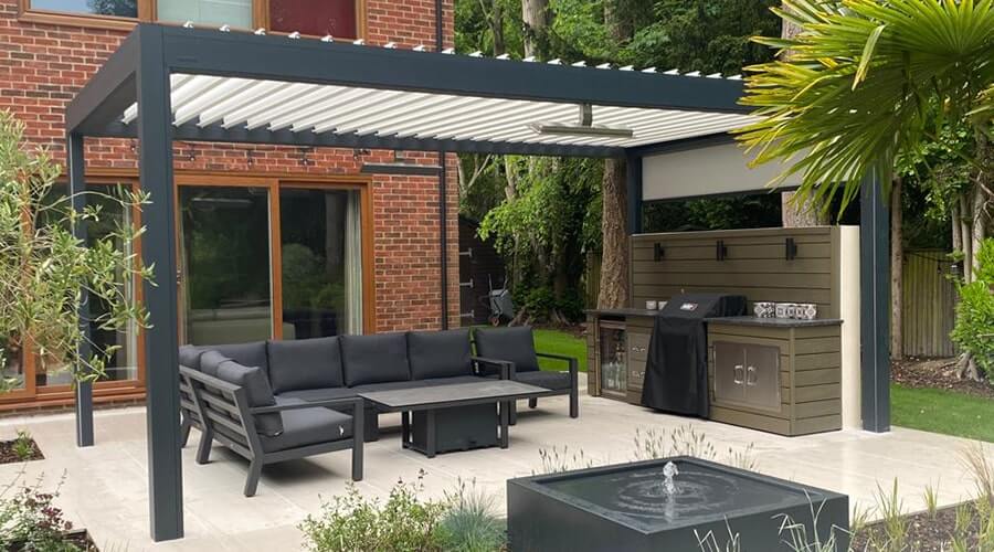 B200XL Pergola Installed in a Garden with a seating area